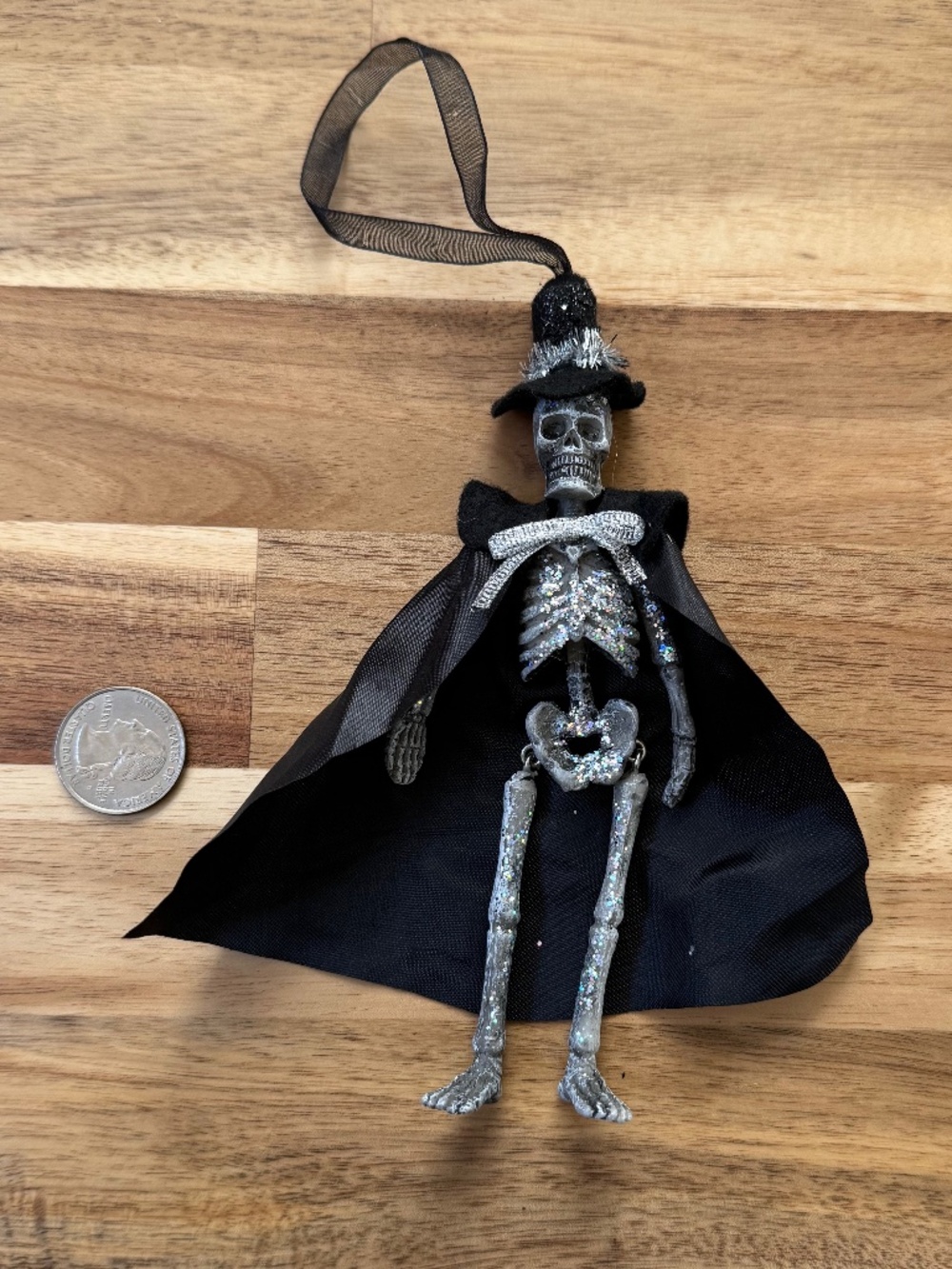 Glitter skeleton with cape and witch hat ornament - black - Joann's